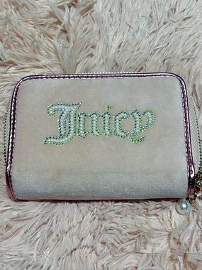 Juicy Couture Cream Wallet with Pink Metallic Trim and Rhinestone Logo.